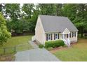 Lovely home with a fenced backyard and well-kept lawn, offering a secure and private outdoor space at 2708 Sundial Cir, Durham, NC 27704