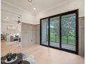 Bright and airy room featuring hardwood floors and a sliding glass doors leading to an outdoor patio at 4 Rainforest Pl, Apex, NC 27523