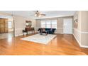 Spacious living room with hardwood floors and views of the front yard at 4536 Massey Rd, Zebulon, NC 27597