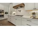 Well-lit kitchen boasts stainless steel appliances, and ample cabinet space at 1141 Duke Farm Dr, Wake Forest, NC 27587