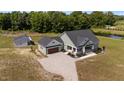 Aerial view of a home showcasing its mature landscaping and spacious surroundings at 540 Pine Ridge Rd, Zebulon, NC 27597