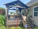 Back deck with covered gazebo, ideal for outdoor entertaining and relaxing at 101 Langston Ridge Dr, Angier, NC 27501