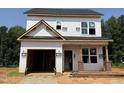 New home construction showing framing, window installation, and roof covered at 103 Goldenrod Loop, Clayton, NC 27520