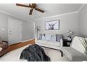 Cozy living room with neutral tones, ceiling fan, hardwood floors, and minimalist decor at 1731 Malone Rd # A, Burlington, NC 27215