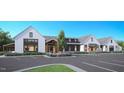Elegant community clubhouse featuring a modern design, ample parking, and professional landscaping at 2309 Abbeyhill Dr # 2, Raleigh, NC 27610