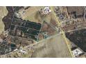 Aerial view of property with boundary lines and surrounding neighborhood at 2657 Joel Johnson Rd, Lillington, NC 27546