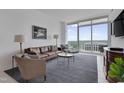 Inviting living room with large windows offering stunning views at 301 Fayetteville St # 2611, Raleigh, NC 27601