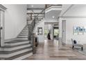 Elegant foyer with hardwood floors, grand staircase, and open layout at 4105 Bankshire Ln, Raleigh, NC 27603
