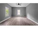 Spacious room featuring light-colored floors, neutral paint and plenty of natural light at 508 Buena Vista Ave, Rocky Mount, NC 27801