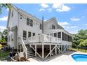 Lovely backyard featuring a deck, patio, in-ground pool and fenced yard at 513 Lake Gaston Dr, Fuquay Varina, NC 27526