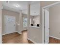 Inviting foyer with hardwood floors leads to the dining area at 960 Sandyhill Rd, Wendell, NC 27591