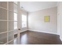 Home office space with natural light from the windows and hardwood floors at 1217 Great Egret Way, Durham, NC 27713