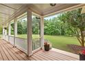 Spacious front porch offering an open view of the landscaped front yard at 3912 Kildrummy Dr, Durham, NC 27705