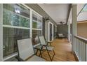 Inviting covered porch with comfortable seating, perfect for relaxing outdoors at 5300 Langdon Dr, Oxford, NC 27565