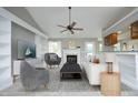 Bright living area featuring a fireplace, built-in shelving and neutral decor that's both inviting and stylish at 3684 Ben Mil Ct, Franklinton, NC 27525
