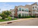 Beautiful condo complex with large windows, offering lots of natural light and great curb appeal at 10310 Sablewood Dr # 111, Raleigh, NC 27617