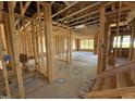 Spacious layout showcasing the framing for a new construction home at 268 Meadowbark Bnd # 42, Garner, NC 27529