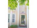 Close-up of the home's front entry, showcasing the front door and surrounding architectural details at 3207 Geary Trl, Raleigh, NC 27610