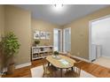 Cozy playroom or study area with a small table, ample storage, and a view of the laundry room at 2067 Glenkirk Dr, Burlington, NC 27215