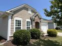 View of a well-maintained home exterior with attractive landscaping and inviting curb appeal at 2535 Kinglass Dr, Fuquay Varina, NC 27526