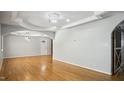Spacious living area featuring hardwood floors and a decorative ceiling at 5820 Wake Forest Hwy, Durham, NC 27703