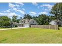 Spacious home features a large backyard and two car garage at 105 Rolling Stone Ct, Sanford, NC 27332