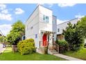 Contemporary two-story home features a bright red front door and modern architectural details at 1314 S East St, Raleigh, NC 27601