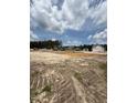 Image shows a construction site with the foundation laid for multiple new buildings at 59 Pine Vista Way, Sanford, NC 27332