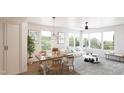 Open-concept living space with a dining area and cozy seating at 130 Two Hills Dr # 205B, Carrboro, NC 27510