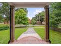 Inviting porch view showcasing the stone walkway and the building across the street at 924 W Trinity Ave, Durham, NC 27701