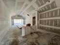 Spacious living room under construction featuring drywall, high ceilings and natural light at 1025 Coldspring Circle, Durham, NC 27705