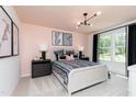 Cozy bedroom featuring stylish decor and a comfortable bed setup at 226 Macon Lake Drive # 41, Apex, NC 27523
