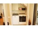 Convenient laundry closet located within the kitchen, features a modern washer and dryer at 108 Calloway Road Rd, Rocky Mount, NC 27804