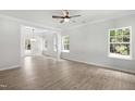 Bright and airy living room boasting hardwood floors, ample natural light, and an open floor plan at 2101 Wimberly Woods Dr, Sanford, NC 27330