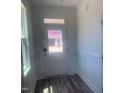 Foyer with wood flooring, natural light, and decorative molding at 28 Carteret Ct # 56, Clayton, NC 27527