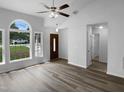Bright living room with lots of light, vaulted ceiling and hard surface floors at 3509 Neptune Dr, Raleigh, NC 27604