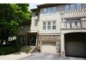 Beautiful exterior of a townhome with attached garage and outdoor balcony at 4810 Glenmist Ct, Raleigh, NC 27612