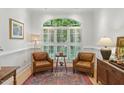 Bright living room with neutral walls, shutters, and stylish decor at 100 Donald Dr, Pittsboro, NC 27312