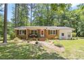 Well maintained, brick and siding house with mature trees at 1139 Princeton Kenly Rd, Kenly, NC 27542