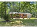 Well maintained, brick and siding house with mature trees at 1139 Princeton Kenly Rd, Kenly, NC 27542