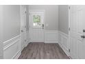 Clean entryway with new floors, fresh paint, and modern trim at 1116 Kingston Grove Drive Dr, Cary, NC 27519