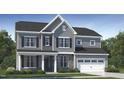 Charming two-story home features a stone facade, gray siding, and a two-car garage at 1625 Goldfinch Perch Ln, Knightdale, NC 27545
