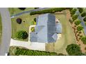 An aerial view of the home and landscaped backyard at 604 Nottely Pl, Cary, NC 27519
