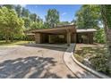 Driveway leading to a porte-cochere, offering covered parking and a stone design at 1846 Hammond St, Rocky Mount, NC 27803