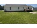 Spacious backyard with a small deck and ample green space at 224 Clearwater Dr, Smithfield, NC 27577