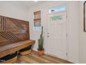 Cozy entryway with unique wood bench and cacti, offering a warm welcome into the home at 903 Grace Point Rd, Morrisville, NC 27560