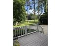 Relax on this deck with beautiful view of the lush green golf course at 7140 N Ridge Dr, Raleigh, NC 27615