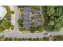 Aerial shot showcasing the neighborhood's layout, well-maintained streets, and manicured landscaping at 100 Tobacco Leaf Ln, Apex, NC 27502