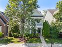 Charming two-story home features covered porch, landscaping, and welcoming entrance at 1201 Somers Dr, Morrisville, NC 27560