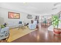 Open-concept living room featuring hardwood floors and neutral color palette at 1312 Regulator St, Raleigh, NC 27603